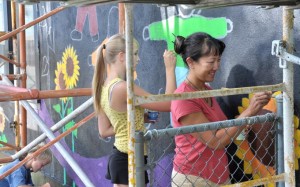 Mural #1 Anita Yeh, Julia Lamb and Lane Foley were the first to arrive on Thursday morning