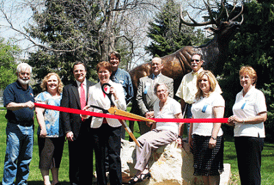 BIZ Mueller ribbon jfolsom Mueller and Associates Cut Ribbon