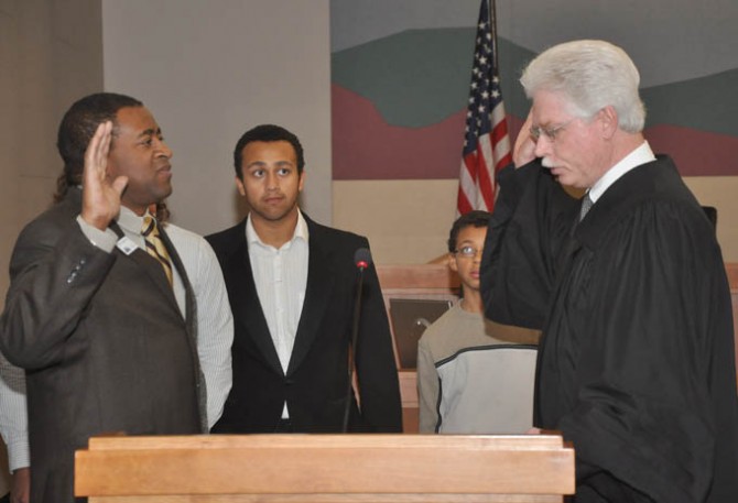 Judge Schapanski administers oath to Lew Gaiter III
