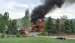 RV fire endangers house in Blue Mountain